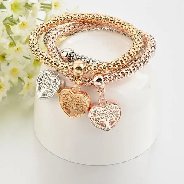 A TREE OF LIFE" HEART EDITION CHARM BRACELET WITH AUSTRIAN CRYSTALS